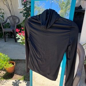 Solid Form Fitting Turtleneck Top